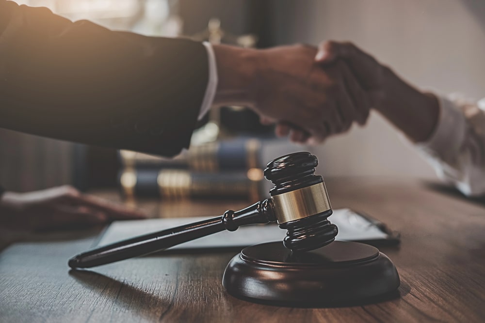 business lawyer handshake deal